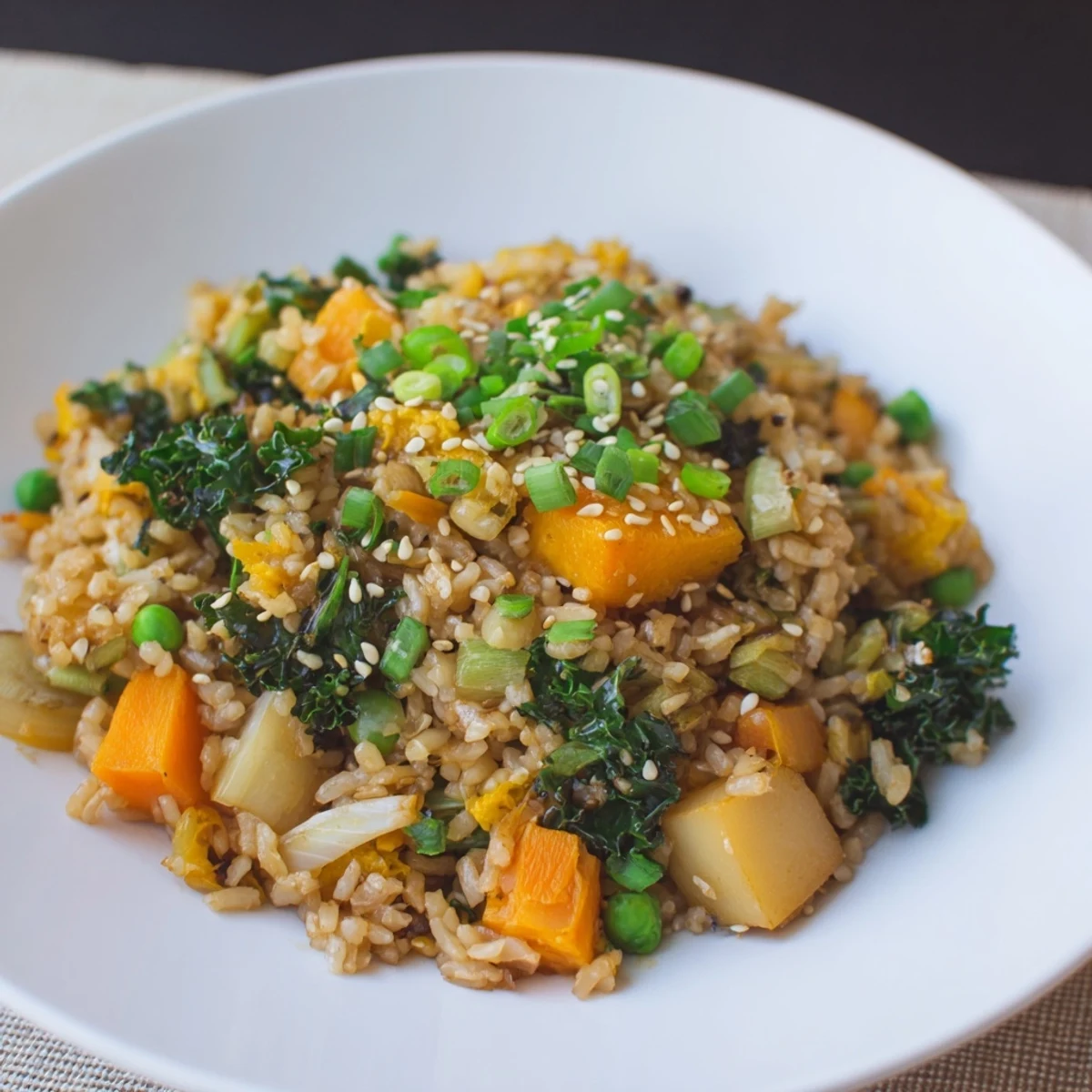 Visually appealing winter vegetable fried rice, a colorful and aromatic vegetarian main dish.