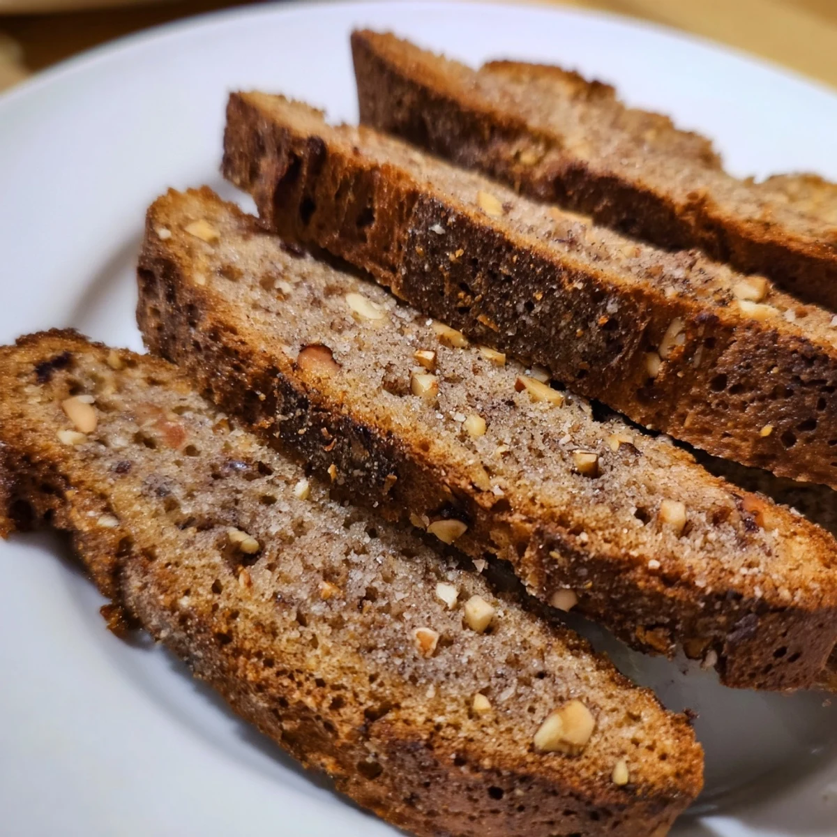 Crunchy Pain d'Épices Latte Biscotti, perfect for dipping, show off a warm, spiced aroma.