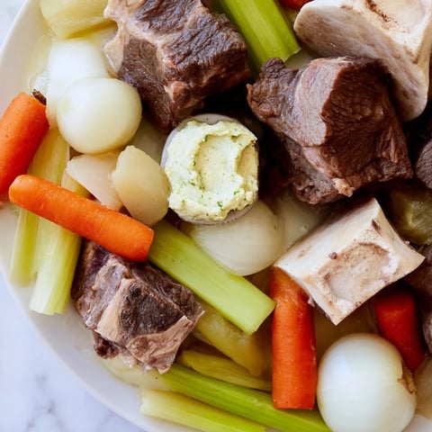 Tender Pot-au-Feu with Root Vegetables, steaming and ready to spoon into bowls with creamy wasabi horseradish.