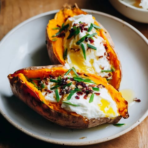 Baked Sweet Potato stuffed with chèvre and honey, golden-brown and glistening after baking.