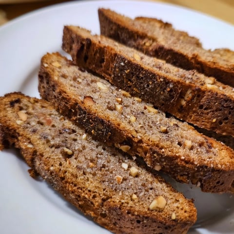 Crunchy Pain d'Épices Latte Biscotti, perfect for dipping, show off a warm, spiced aroma.