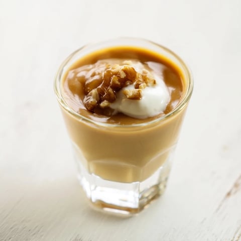 Velvety smooth Quick Chestnut Soup Shooter, garnished with fresh chives, ready to serve as a starter.