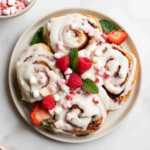 Here are three SEO-optimized ALT image texts for the recipe "North Pole Cinnamon Roll Board":