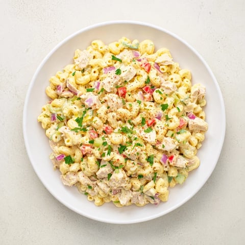 Chicken Macaroni Holiday Salad, a creamy, cold Southern classic, with colorful veggies and chicken pieces.