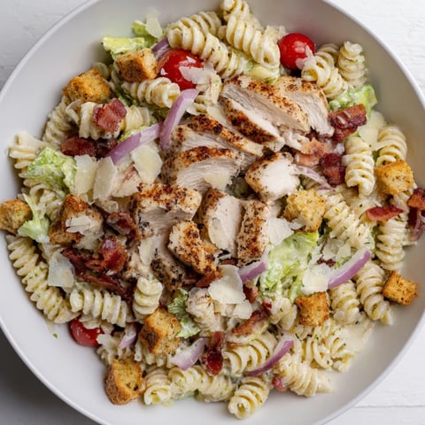 Sure, here are three SEO-optimized ALT image texts for your Chicken Caesar Pasta Salad recipe:
