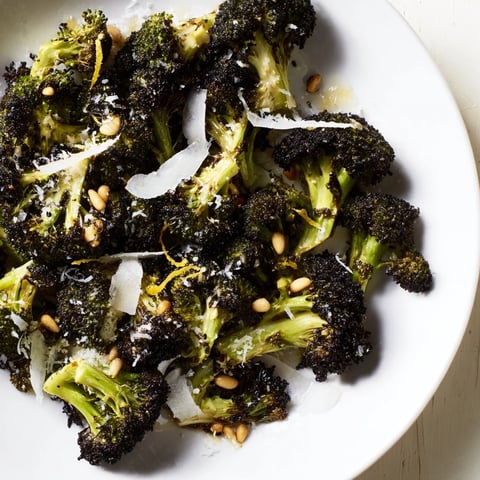 Charred Broccoli Salad, a colorful salad with roasted broccoli and Parmesan, ready to serve.