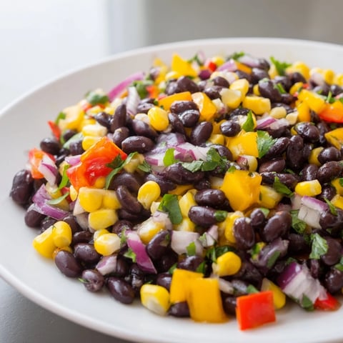 Vibrant Southwest Black Bean Salad, a colorful mix of beans and veggies tossed in lime vinaigrette.