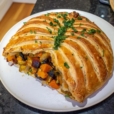 This warm Winter Vegetable Pithiviers features a delightful mix of veggies baked inside a puff pastry.