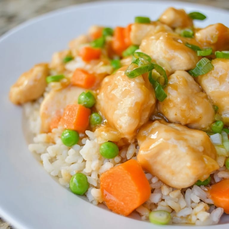 Close-up of Butter Chicken Fried Rice, a flavorful blend of Indian and Chinese cuisines.